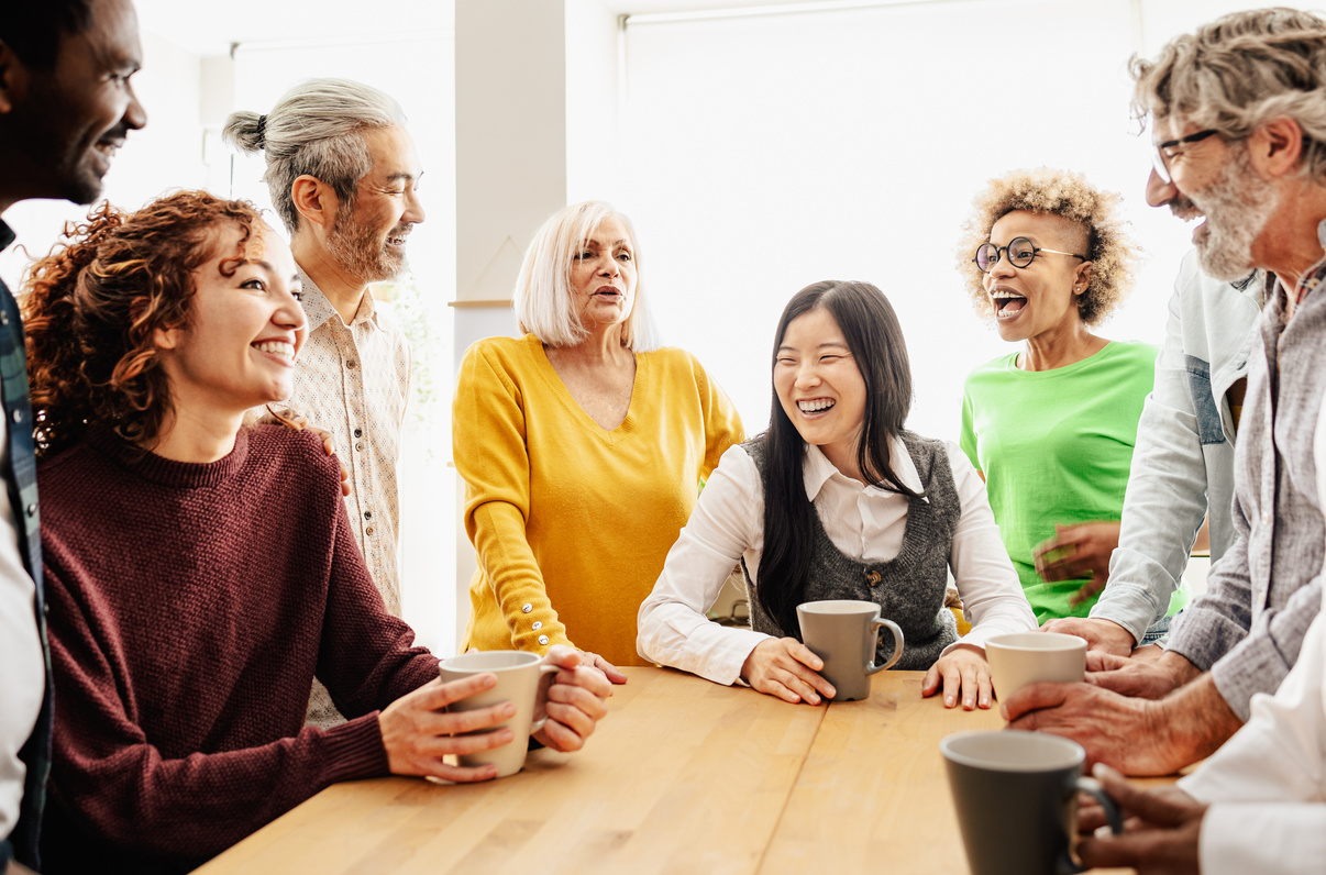 Happy multiracial people with different ages and ethnicities hav